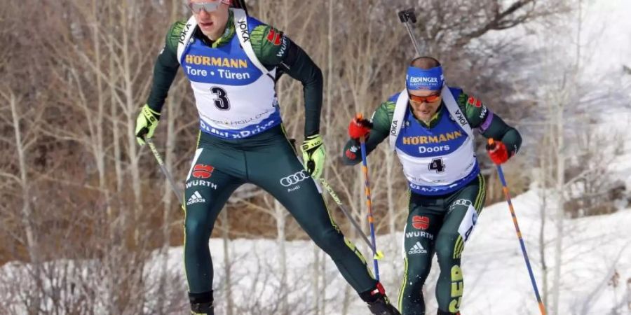 Die deutschen Biathleten Roman Rees (l) und Erik Lesser (r). Foto: Rick Bowmer/AP