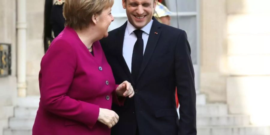 Merkel und Frankreichs Präsident Macron