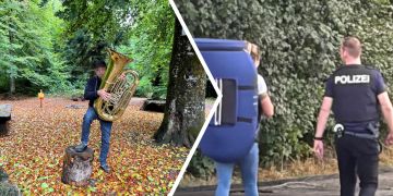 Konzertende: Die Kantonspolizistin trägt das 13 Kilo schwere Instrument weg - ihr Kollege bietet Geleitschutz.