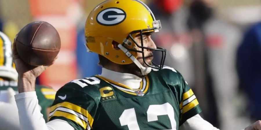 Green Bay Packers-Quarterback Aaron Rodgers ist bei einem Spiel in Aktion. Foto: Jeffrey Phelps/AP/dpa