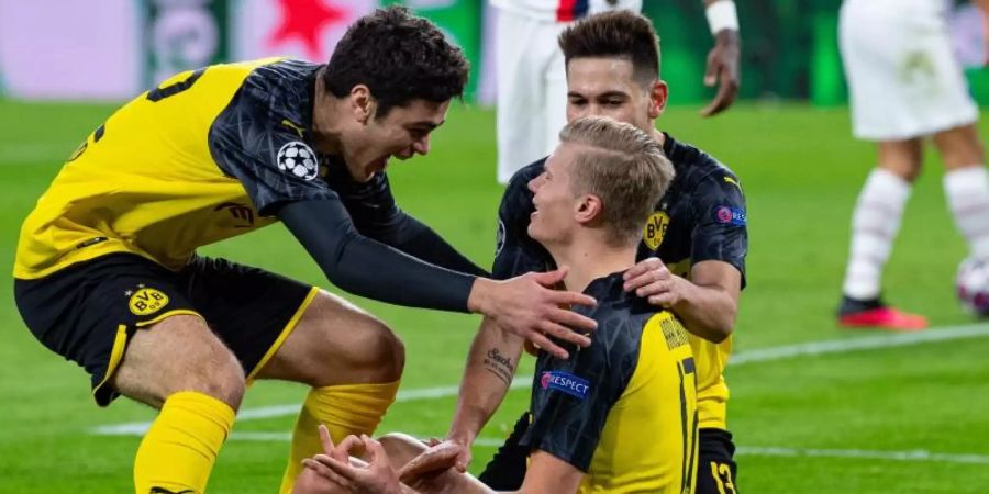 Jubel im Schneidersitz: BVB-Torjäger Erling Haaland. Foto: Guido Kirchner/dpa