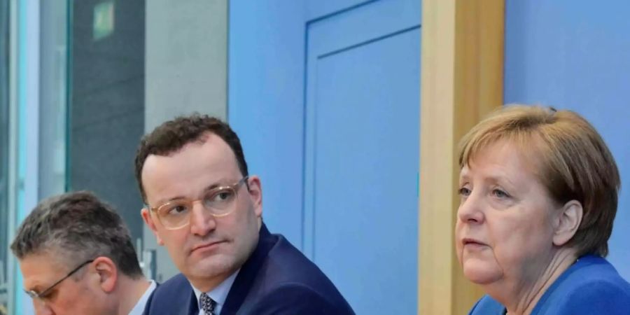 RKI-Chef Wieler, Minister Spahn (M.) und Kanzlerin Merkel