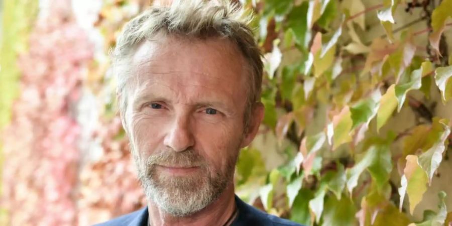 Jo Nesbø hat eine Stiftung gegründet, die Analphabetismus in Entwicklungsländern bekämpft. Foto: Jens Kalaene/dpa