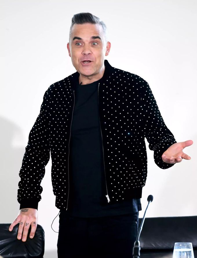 Mit einem selbstbewussten Auftreten hatte Robbie Williams noch nie ein Problem. helene fischer