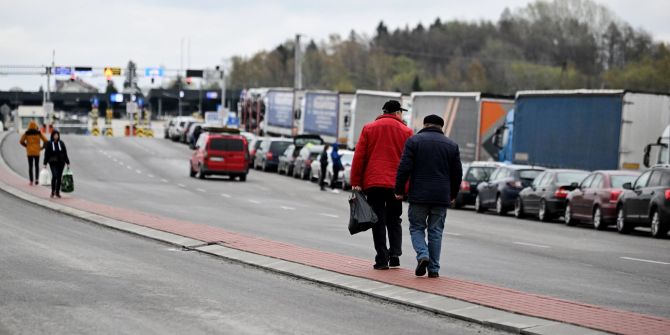 Cars queue the Polish Ukrainian border in Medyka