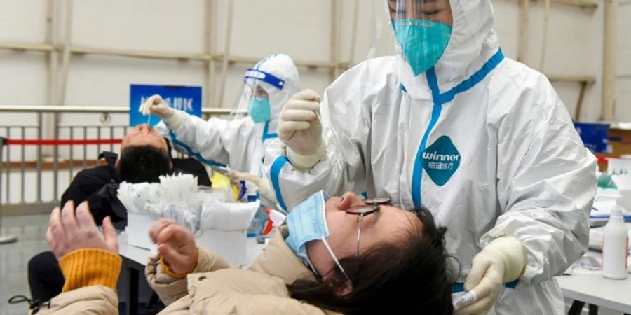 Die Behörden in China setzen unter anderem auf Massentests