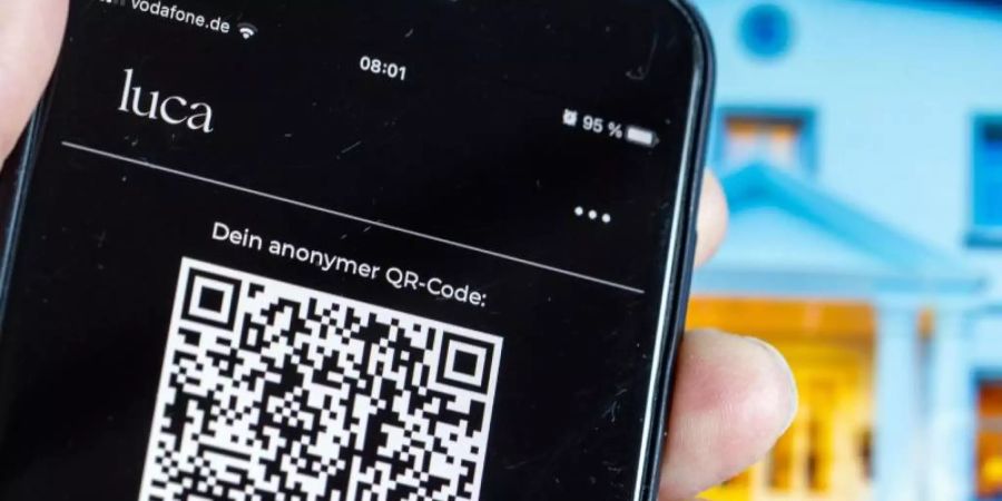 Die Luca App ermöglicht verschlüsselte Kontaktdatenübermittlung für Gastgeber und ihre Gäste. (Illustration). Foto: Jens Büttner/dpa-Zentralbild/dpa