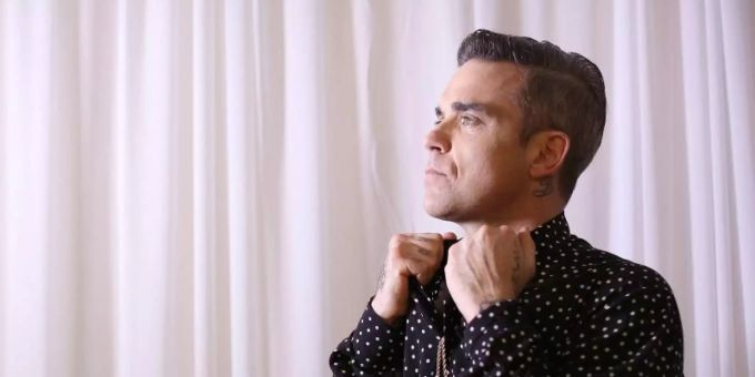 Robbie Williams hatte immer wieder auch mit seinen Dämonen zu kämpfen. Foto: David Moir/AAP/dpa Robbie Williams hatte immer wieder auch mit seinen Dämonen zu kämpfen. Foto: David Moir/AAP/dpa