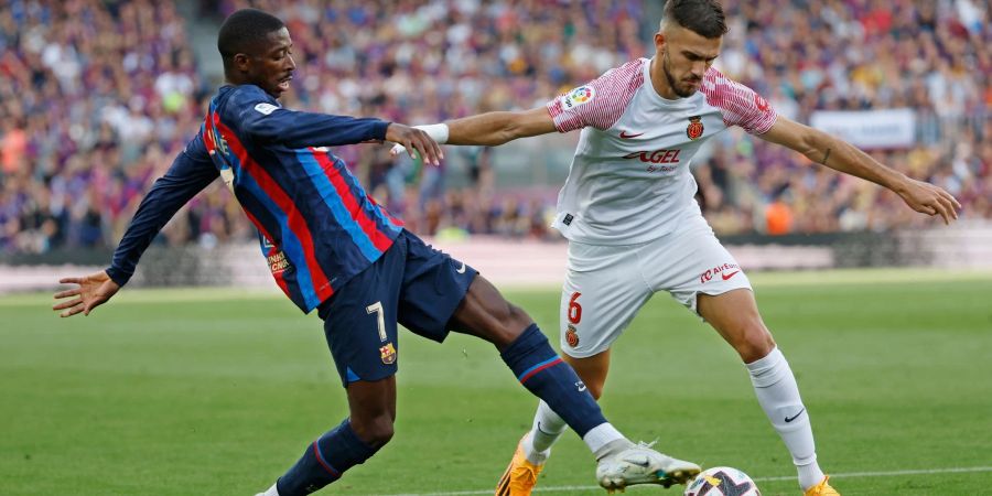 Der frühere Dortmunder Ousmane Dembélé (l) steht offenbar vor einem Wechsel zu Paris Saint-Germain.