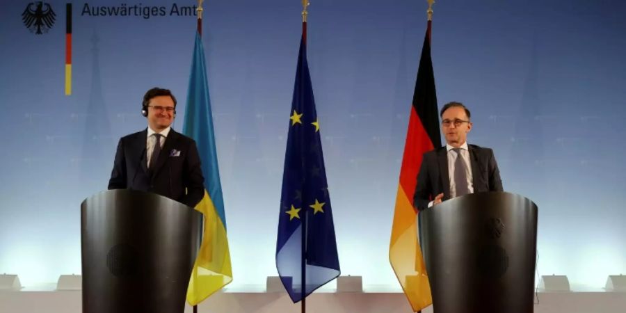 Heiko Maas (r.) und Dmytro Kubela (l.) in Berlin