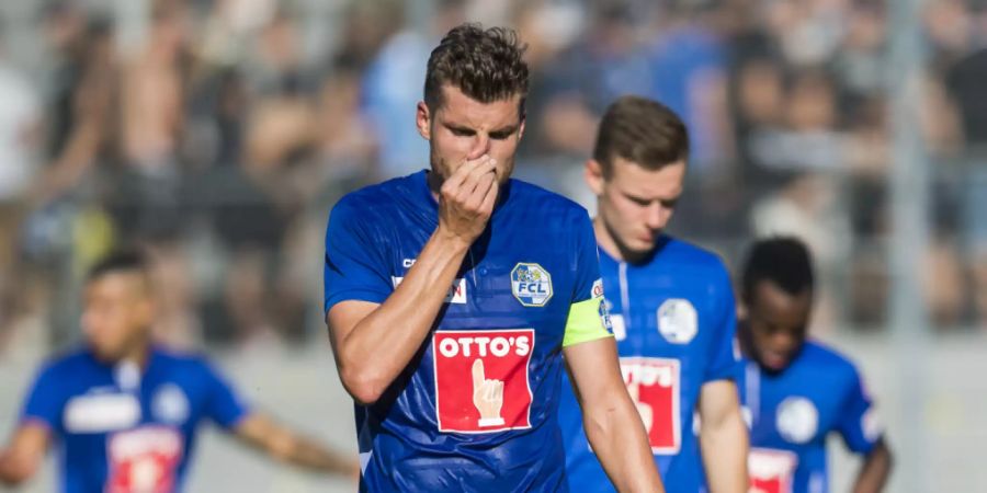 Geschlagene Luzerner auch in Sitten: Captain Pascal Schürpf und seine Kollegen lassen die Köpfe hängen