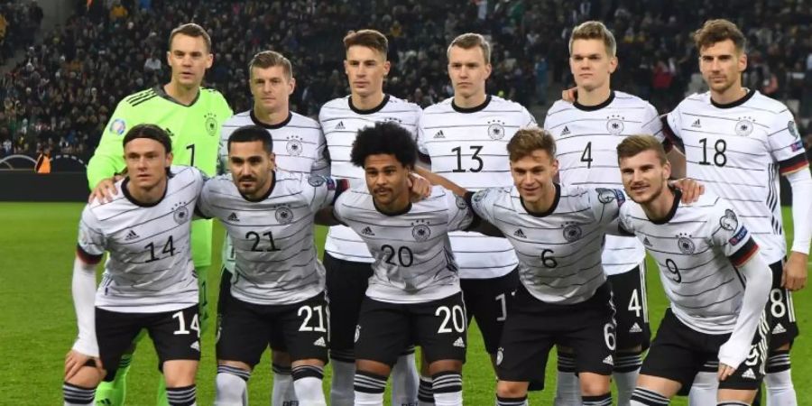 Auch das DFB-Team tut Gutes in der Corona-Krise. Foto: Federico Gambarini/dpa