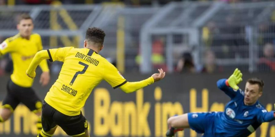 Jadon Sancho machte das BVB-Tor zum 1:0. Foto: David Inderlied/dpa