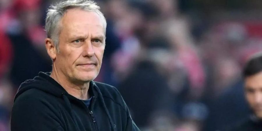 Freiburg-Trainer Christian Streich echauffiert sich über die eigenen Fans. Foto: Monika Skolimowska/dpa-Zentralbild/dpa
