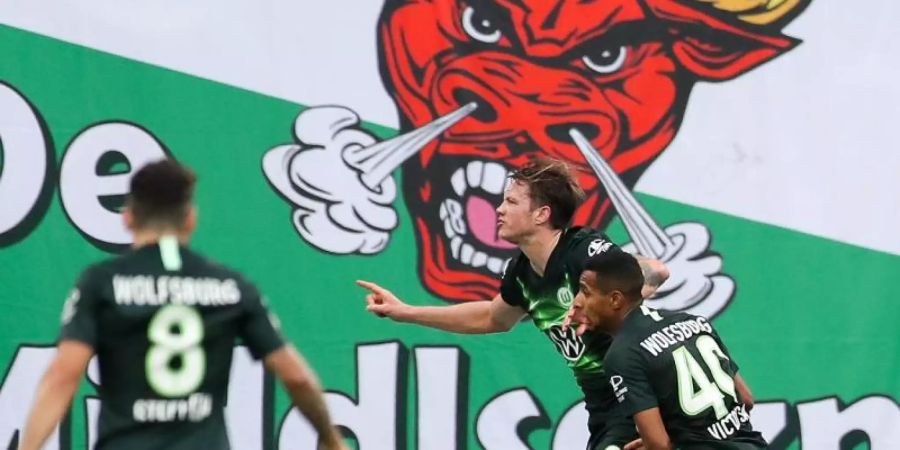 Wolfburgs Spieler hatten auch in Leipzig Grund zum Jubel. Foto: Jan Woitas/dpa-Zentralbild/dpa