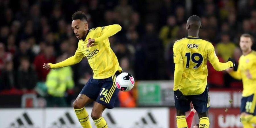 Ging mit Arsenal in Sheffield als Verlierer vom Platz: Ex-BVB-Torjäger Pierre-Emerick Aubameyang (l). Foto: Danny Lawson/PA Wire/dpa