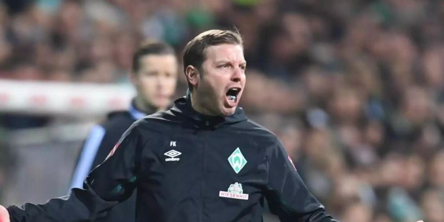 Stellt sich auch nach der 0:5-Pleite gegen Mainz in Bremen der Verantwortung: Werder-Coach Florian Kohfeldt. Foto: Carmen Jaspersen/dpa