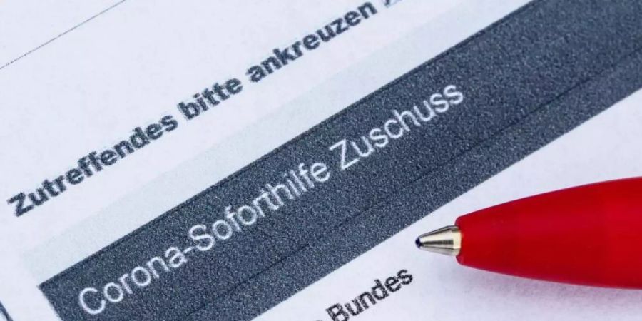 Der Bund plant milliardenschwere Nothilfen für Unternehmen, die von den vorübergehenden Schliessungen zur Eindämmung des Coronavirus betroffen sind. Foto: Robert Michael/dpa-Zentralbild/dpa