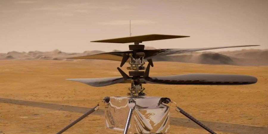 Die von der NASA zur Verfügung gestellte Illustration zeigt den «Ingenuity-Hubschrauber» auf der Marsoberfläche. Foto: -/NASA/JPL-Caltech/dpa