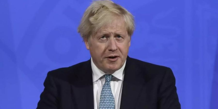 Boris Johnson, Premierminister von Grossbritannien, spricht bei einer Pressekonferenz zur Corona-Pandemie. Foto: Matt Dunham/AP Pool/dpa