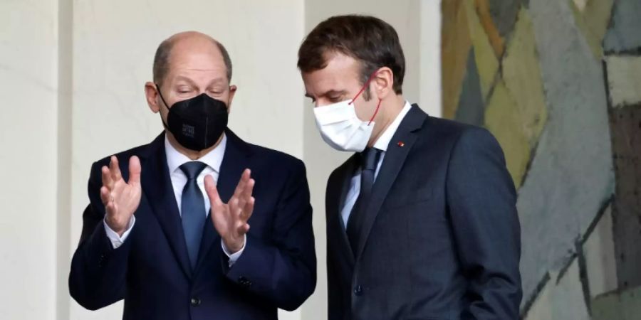 Olaf Scholz (l.) und Emmanuel Macron