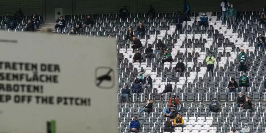 Lediglich 300 Gladbach-Fans dürfen das Spiel gegen Wolfsburg im Stadion verfolgen. Foto: Bernd Thissen/dpa