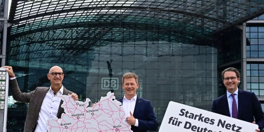 Telekom-Chef Höttges, Bahn-Chef Lutz, Minister Scheuer