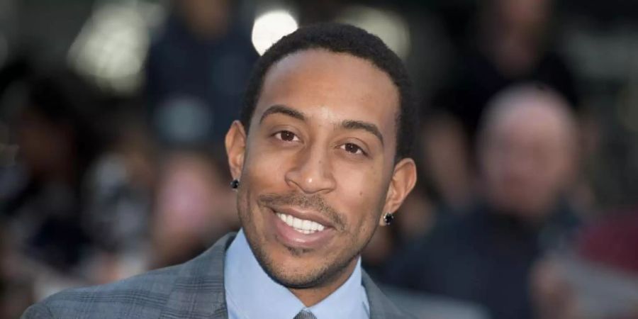US-Rapper und Schauspieler Chris «Ludacris» Bridges bei der Weltpremiere von "Fast and Furious 6". Foto: Will Oliver/EPA/dpa