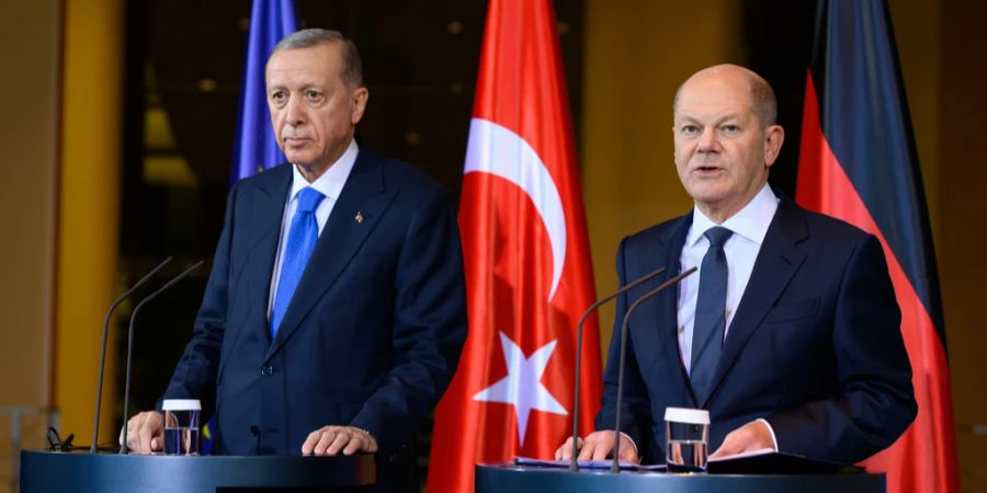 scholz erdogan asylanten abschiebung