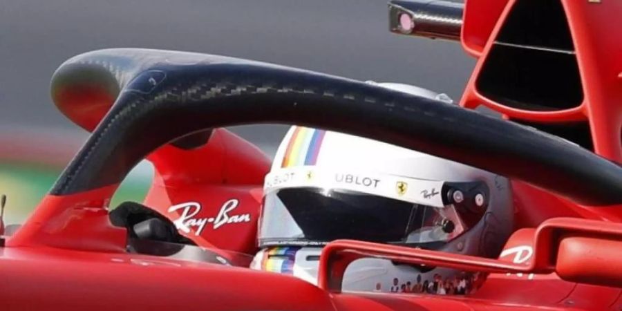 Der Helm von Sebastian Vettel brachte 225.000 Euro ein. Foto: Murad Sezer/POOL REUTERS/dpa