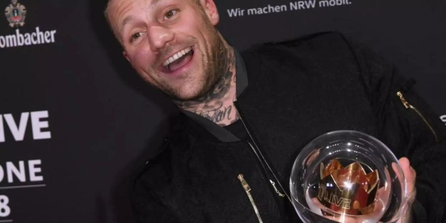 Der Rapper Kontra K beansprucht die Chartspitze für sich. Foto: Henning Kaiser