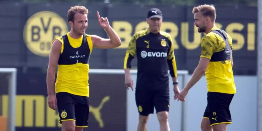 Hat wieder richtig Spass beim BVB: Mario Götze (l). Foto: Federico Gambarini