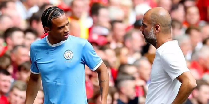 Leroy Sané und Man-City-Trainer Pep Guardiola. Foto: Martin Rickett/PA Wire Ottmar Hitzfeld Sané Guardiola