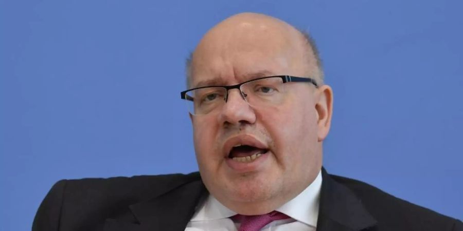 Homeoffice passe nicht überall, meint Wirtschaftsminister Peter Altmaier. Foto: Tobias Schwarz/AFP/Pool/dpa