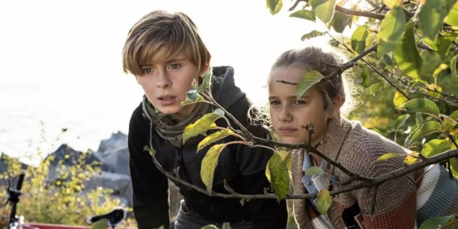 Leander Pütz als Jonny und Charlotte Martz als Clarissa in einer Szene des Films "Die Pfefferkörner und der Schatz der Tiefsee". Foto: -/Wild Bunch Germany/dpa