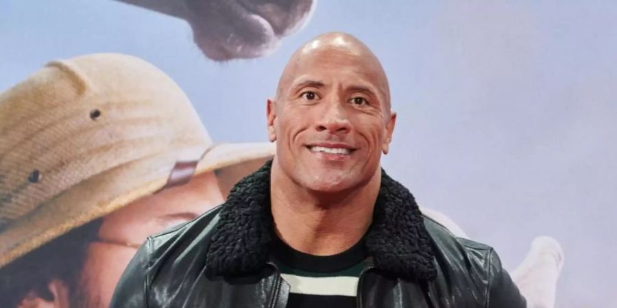 Der Schauspieler Dwayne Johnson will die Demokraten wählen. Foto: Annette Riedl/dpa