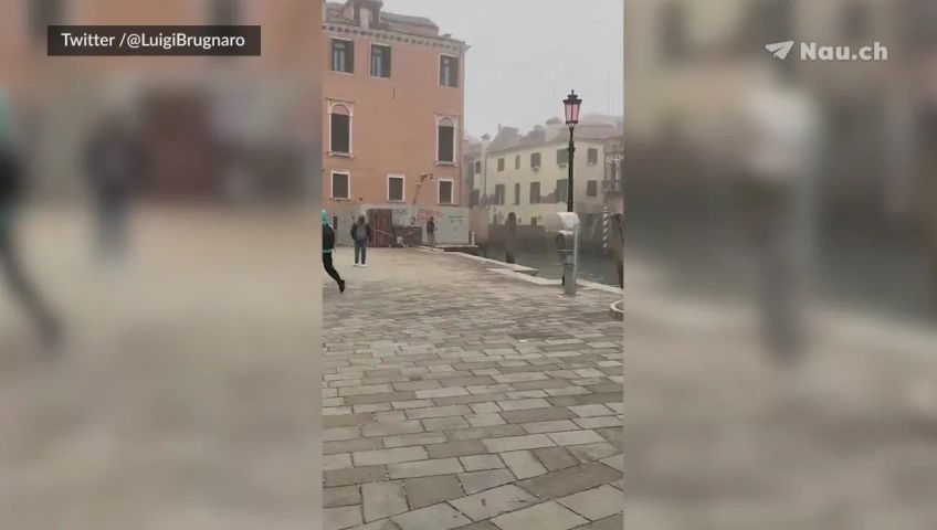 mann-springt-in-venedig-in-einen-kanal