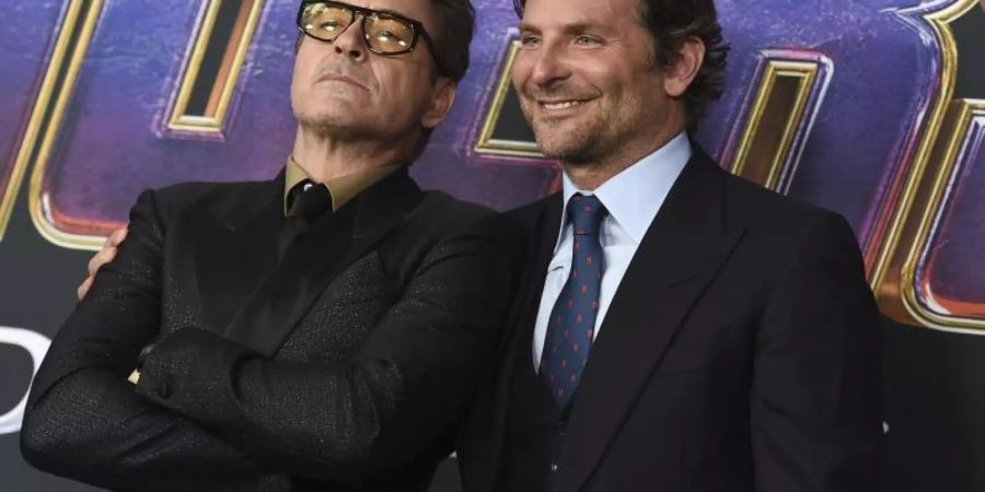 Robert Downey Jr. (l) und Bradley Cooper bei der Premiere von «Avengers: Endgame» in Los Angeles. Foto: Jordan Strauss/Invision/AP