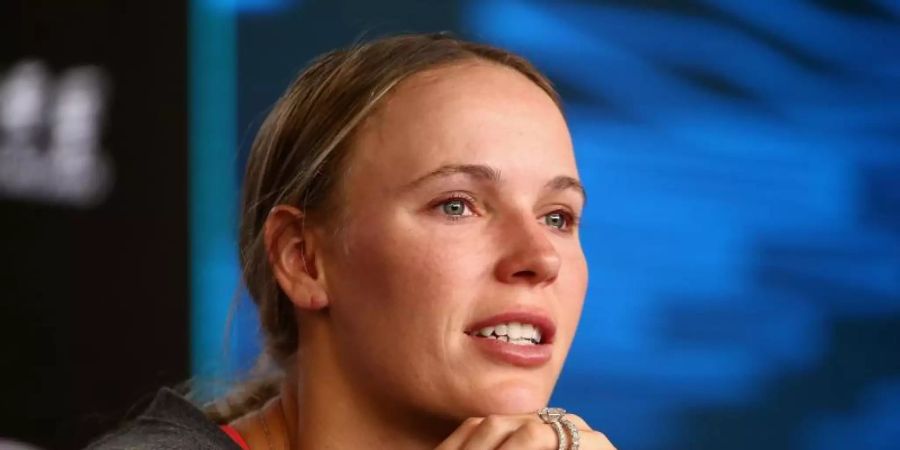 Caroline Wozniacki freut sich über ein Mädchen. Foto: Rob Prezioso/AAP/dpa