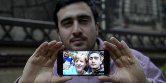 «Land ist zerstört» - Merkels Selfie-Syrer will nicht zurückkehren