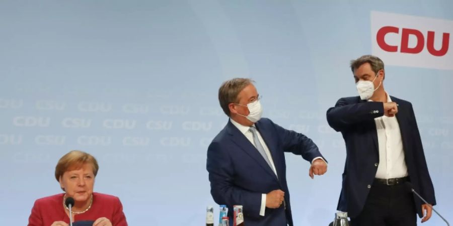 Merkel, Laschet, Söder