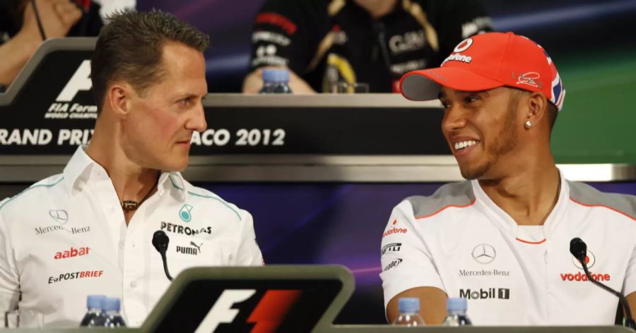 Michael Schumacher (l.) und Hamilton haben jeweils sieben WM-Titel, keiner hat mehr! Mit einem achten Erfolg könnte der Brite alleiniger Rekordhalter werden.