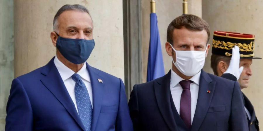 Kadhemi (l.) mit Macron in Paris