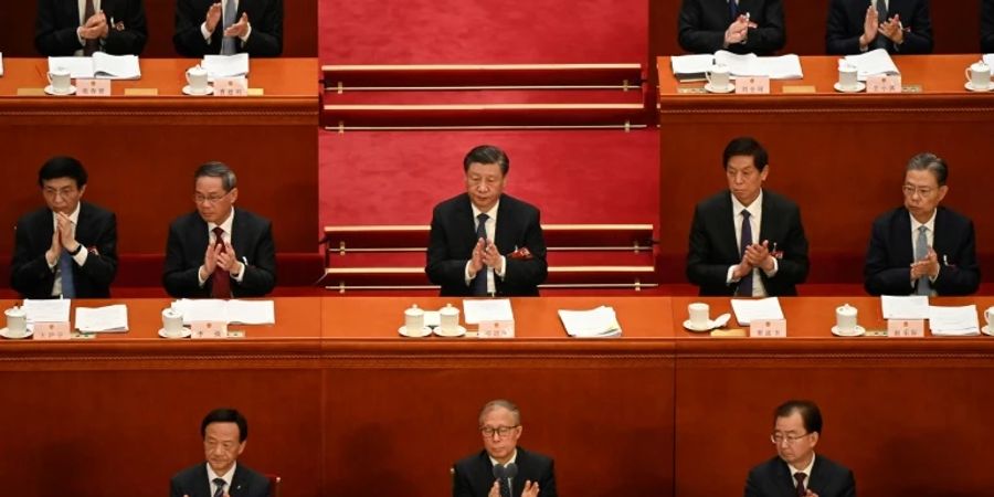 Chinas Präsident Xi Jinping (Mitte)