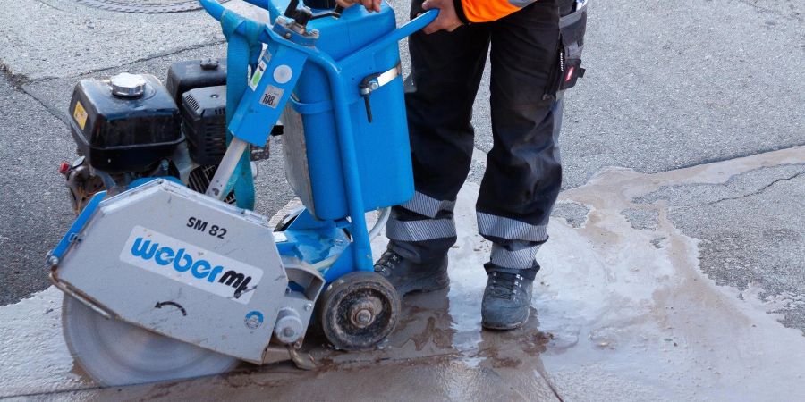 Strassenbau Arbeiter Maschine Stein