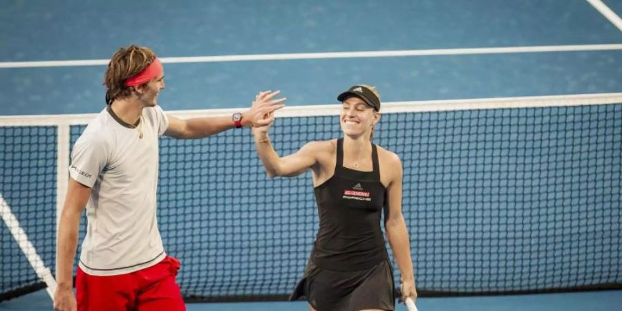Kann sich bei Olympia ein Mixed mit Alexander Zverev (l) vorstellen: Angelique Kerber (r). Foto: Tony Mcdonough/AAP/dpa
