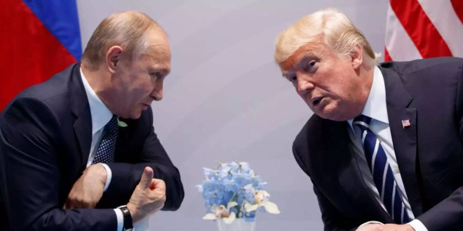 Wladimir Putin (l.), Russlands Präsident, und Donald Trump(r.), Präsident der USA, kommen schon jetzt gut miteinander aus. Trump hofft aber auf mehr.