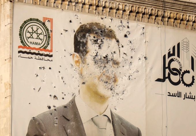 Die Rebellen bejubeln die Assads Flucht aus Syrien. Flucht aus Syrien Assad