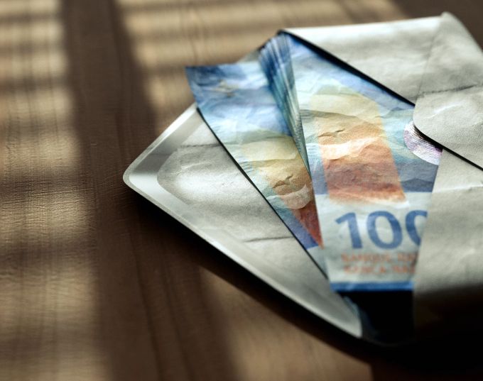 Legen Sie das Geld in eigene Umschläge zurecht, so sparen Sie für jeden Bereich die passende Summe. Shopping