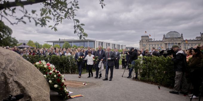 People attend the official opening of the temporary memorial for Polish victims of World War II, in Berlin, Germany, Monday, June 16, 2025. (AP Photo/Markus Schreiber).Germany Poland World War II Germany Poland World War II